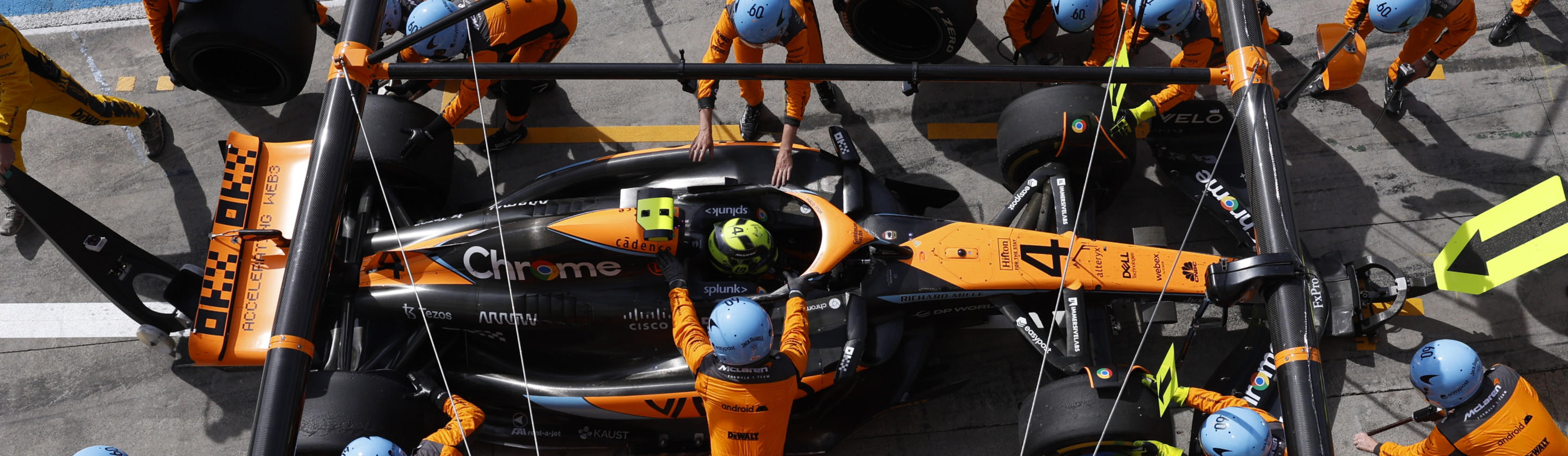 McLaren car being serviced by team
