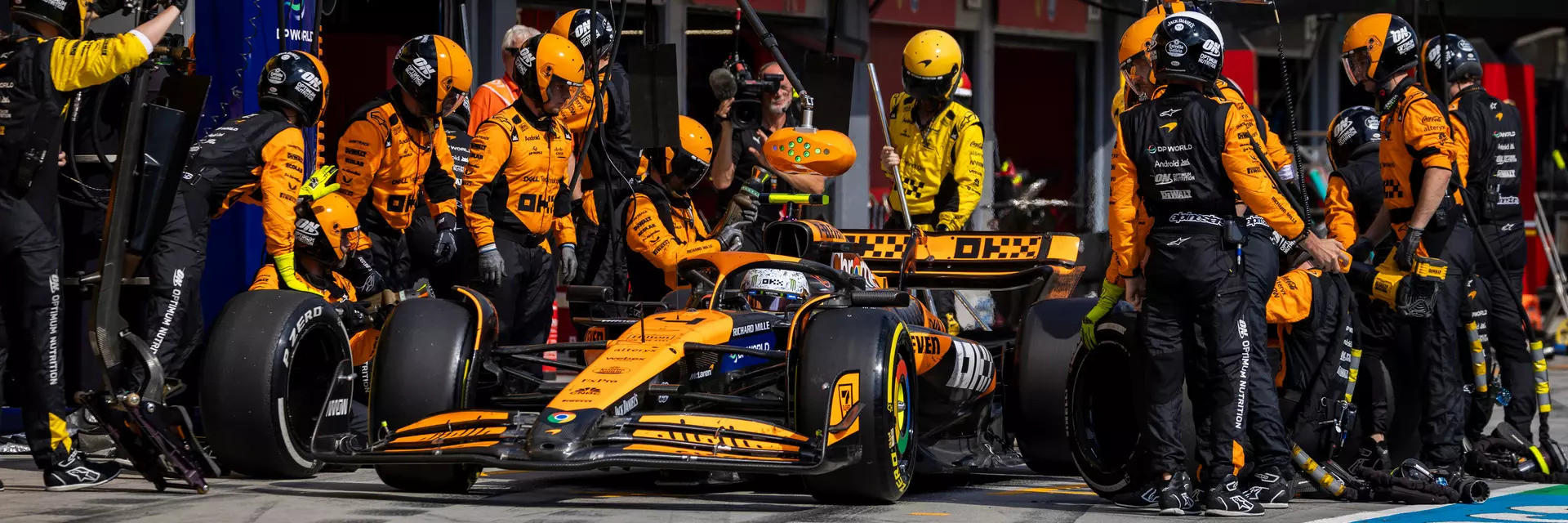 McLaren car being serviced by team