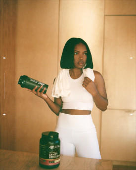 Ryan Destiny with an Optimum Nutrition shaker bottle